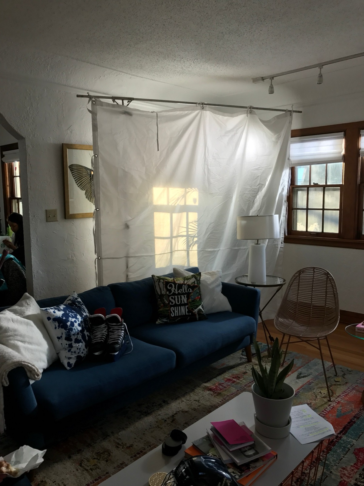 Pilot: the living room set, with a sheet of diffusion hung inside and a window pattern thrown through it