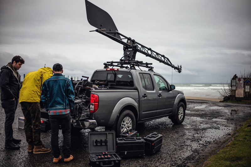 CR-V: the crane truck rigged at Cannon Beach, crew prepping the camera in the rain