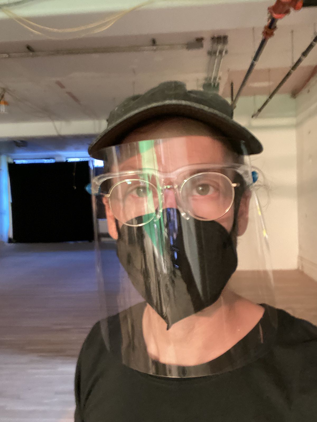 Adam in face shield and mask, peak Covid