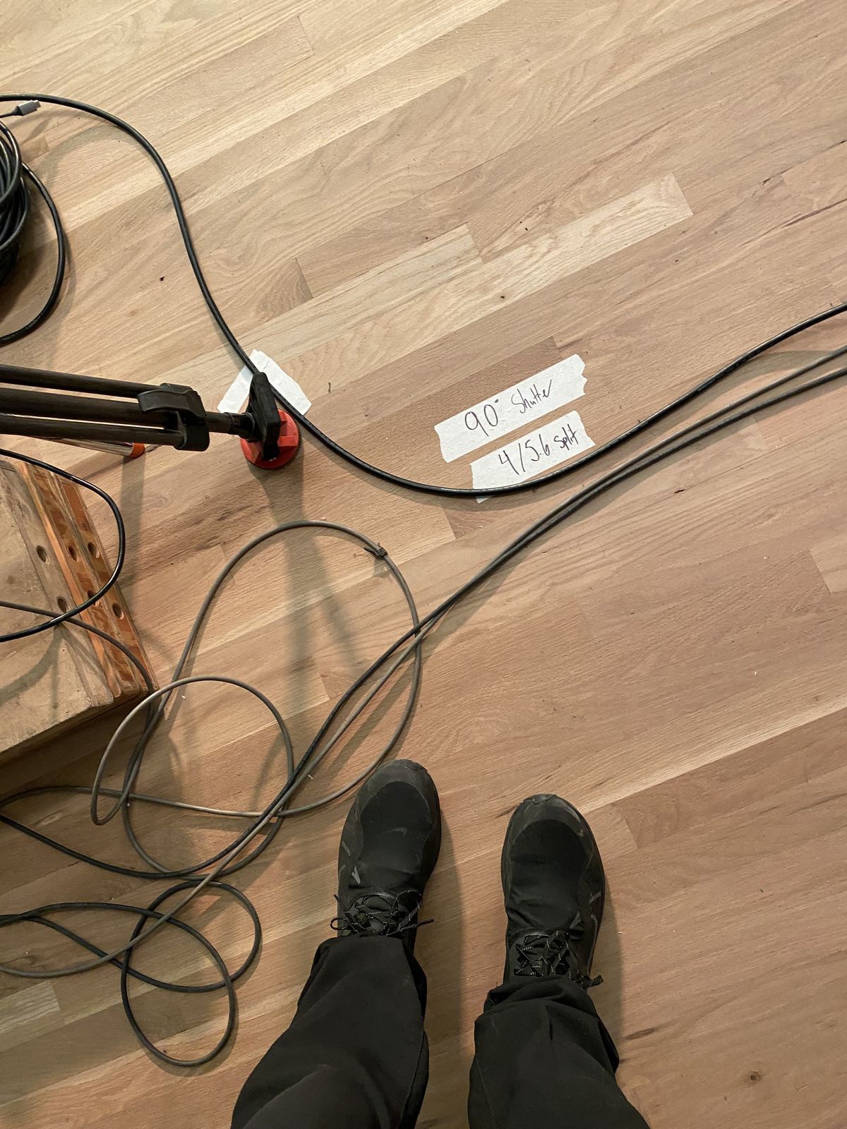 floor tape: "90° Shutter 4/56 split" camera marks