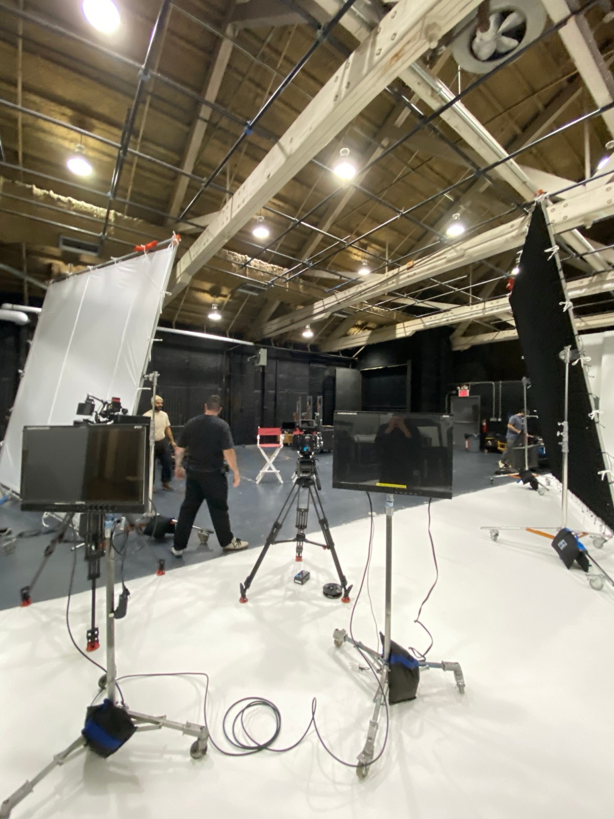 The build: a 12x12 on each side, monitors and the A camera on sticks, the chairs on their marks