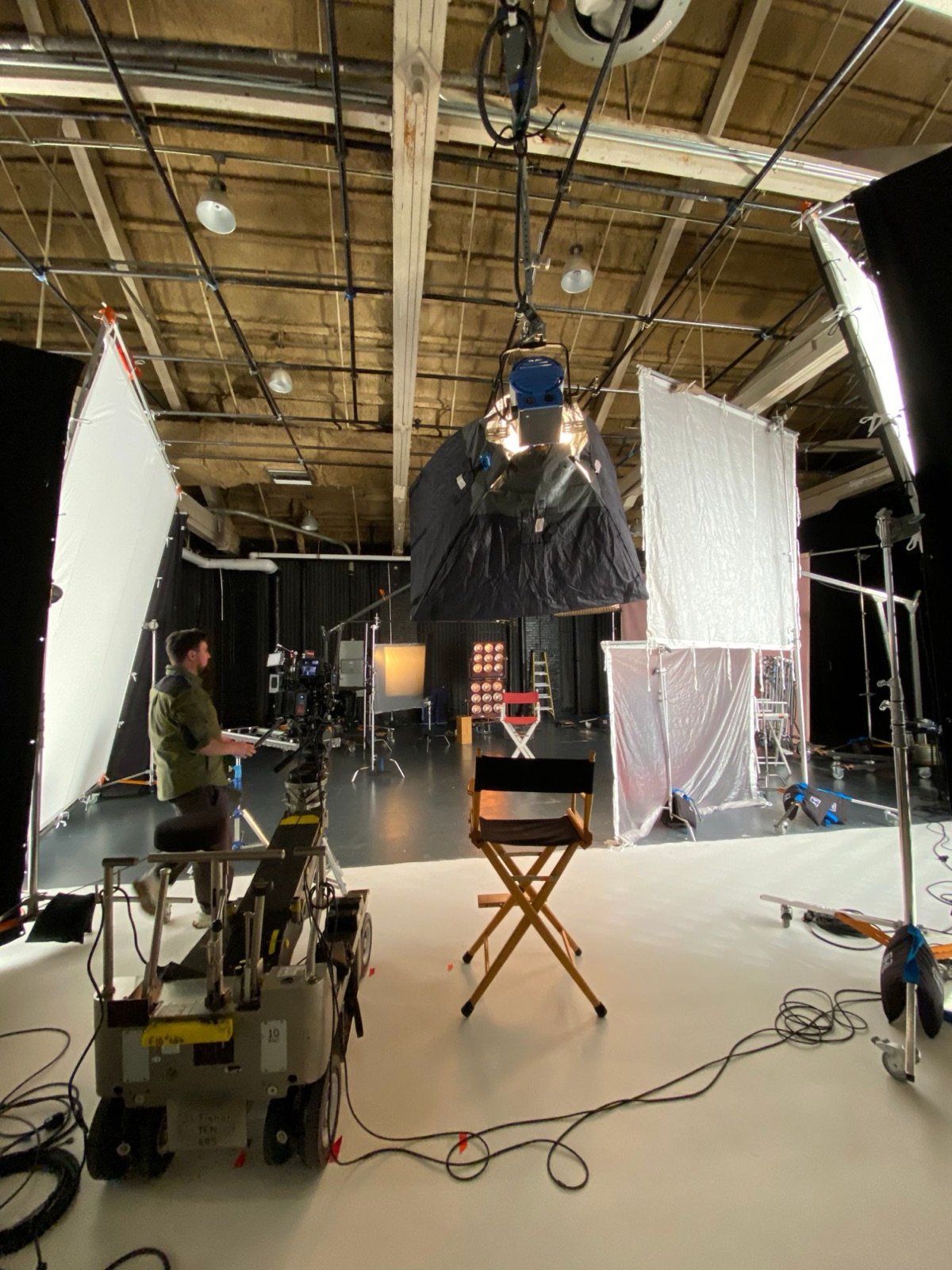 The key: a 5K in a Chimera flown overhead, 12x12s either side, the 9-light and Fresnel set dressing beyond