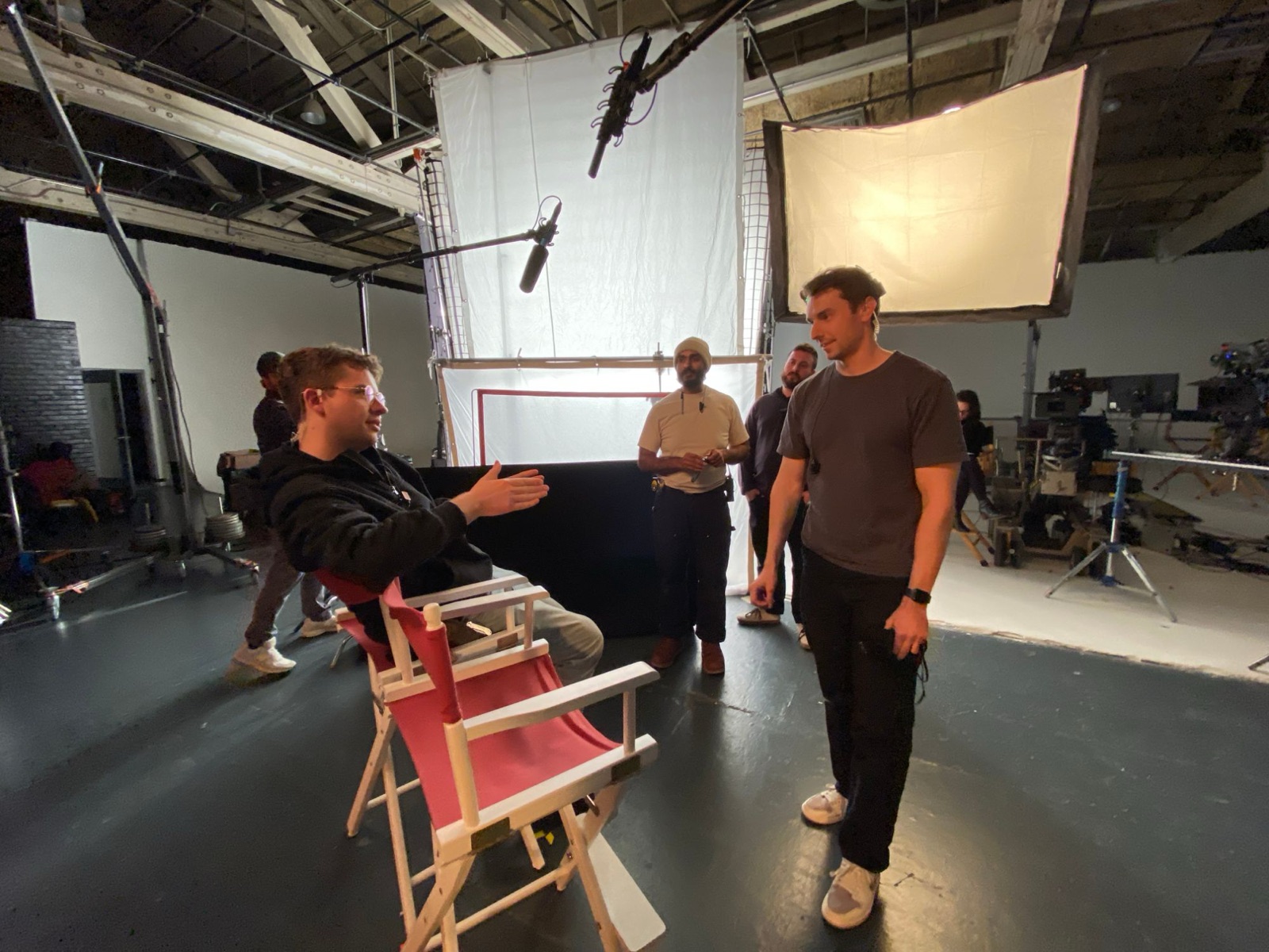 Walking through the setup with the crew before talent