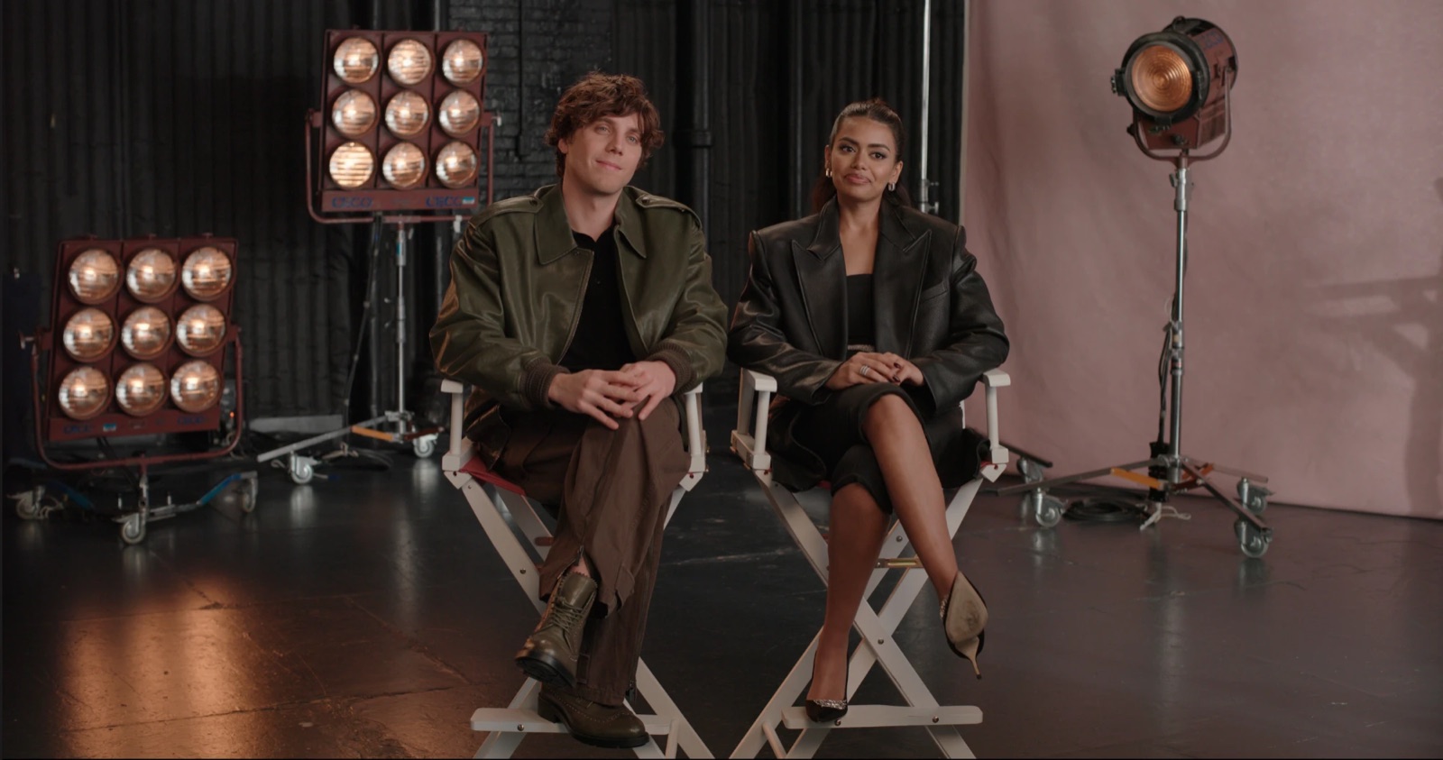 Frame: Lukas Gage and Megan Suri on the interview set